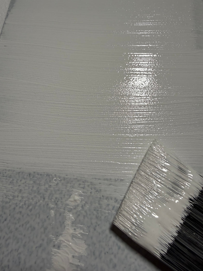 Cadoro Quartz Primer being applied by brush